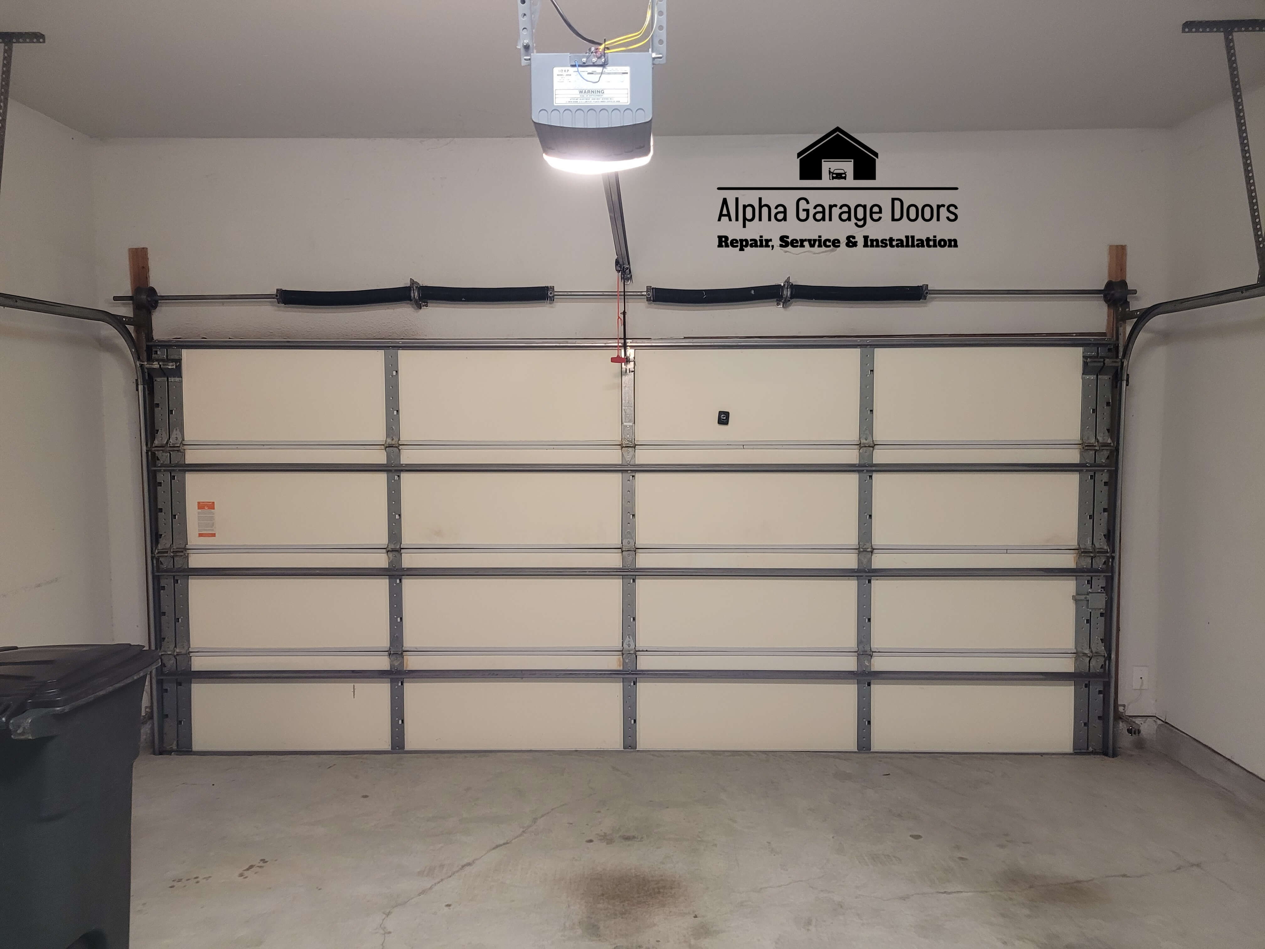 garage-door-torsion-springs-replacement.jpg